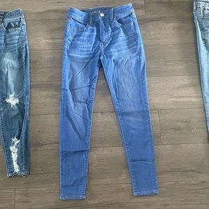 AE blue wash high rise Jegging size 2 SHORT